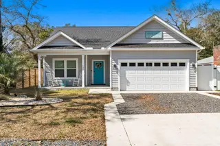 135 NW 7th Street, Oak Island, NC 28465 – photo 1: 137 NW 7th st