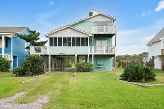 3518 E Pelican Drive, Oak Island, NC 28465 – photo 1: 3518EastPelicanDrive-1