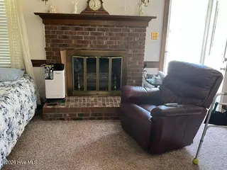 7669 S Nc 58 S, Elm City, NC 27822 – photo 10: fireplace Duke
