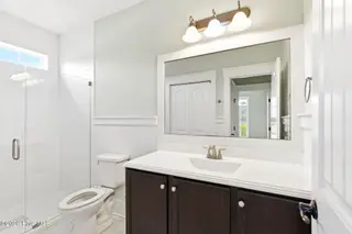 1454 Dunes Boulevard SW, Ocean Isle Beach, NC 28469 – photo 24: Shared 1st floor guest bath