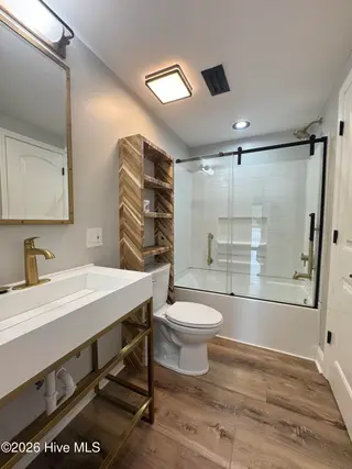 113 NW 12th Street, Oak Island, NC 28465 – photo 13: Bathroom