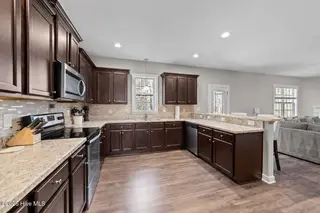 94 Diamond Creek Drive, Clayton, NC 27520 – photo 6: 94 diamond creek kitchen 3