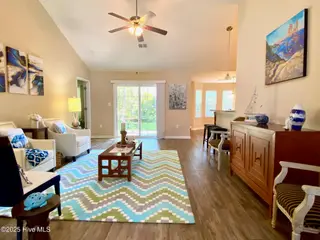 11 Court 11 Northwest Drive NW, Carolina Shores, NC 28467 — 3-bedroom home in Carolina Shores, Carolina Shores, NC, photo 3 of 28: 3- Living Room