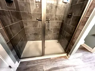 412 Taylor Place, Goldsboro, NC 27430 — 2-bedroom townhome in Taylor Commons, Goldsboro, NC, photo 18 of 24: Walk in shower