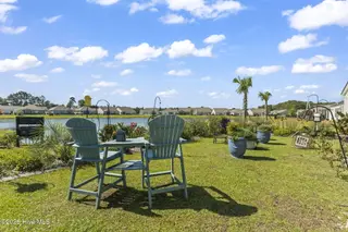 9410 Barnstormer Drive NW, Calabash, NC 28467 — 3-bedroom home in Eagle Run, Calabash, NC, photo 2 of 47: Backyard