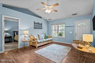 213 NE 48th Street, Oak Island, NC 28465 – photo 7: 24-web-or-mls-Photo Aug 21 2025, 10 56 0