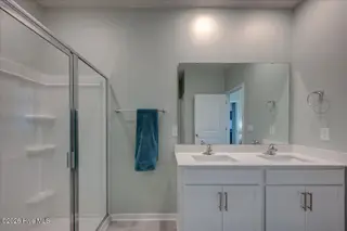 2021 Caracara Drive, New Bern, NC 28560 – photo 24: Master BR with walk-in shower