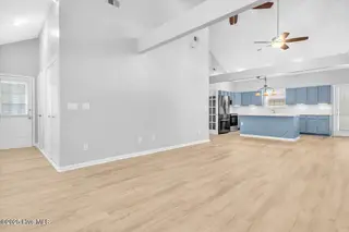127 NW 19th Street, Oak Island, NC 28465 – photo 11: Open concept Living/dining room