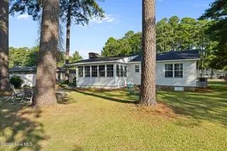 3838 Longleaf Drive NE, Elm City, NC 27822 – photo 23: 22-Rear View