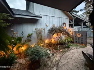 171 Cranes Cove, Vass, NC 28394 – photo 7: 3_Exterior-Side-Yard-Dusk_171-Cranes-Cov