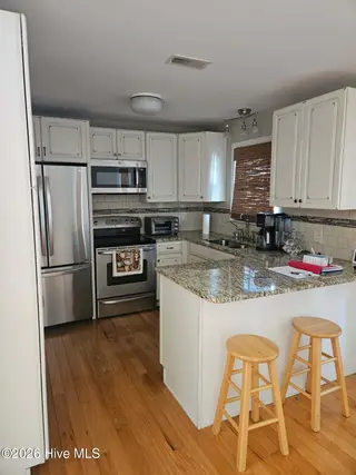 804 Fayetteville Avenue, Carolina Beach, NC 28428 – photo 11: Lola kitchen1