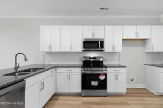 241 Cline Way Unit 110, Beaufort, NC 28516 – photo 12: Kitchen- Open Concept to Dining & Living
