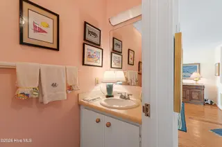590 Westport Drive H1 Westport, Pine Knoll Shores, NC 28512 – photo 19: First floor half bath