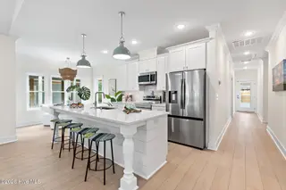 163 NW 4th Street, Oak Island, NC 28465 – photo 15: 4th Street Staged-5