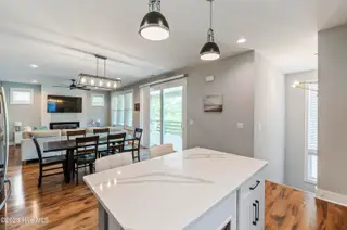 119 NE 27th Street, Oak Island, NC 28465 – photo 12: island sliders lr