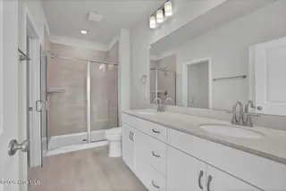 6787 Fellowship Drive, Leland, NC 28451 — 4-bedroom townhome in Grand Park, Leland, NC, photo 15 of 46: Primary Bath