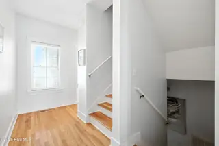 1106 Fort Fisher Boulevard N Unit 1, Kure Beach, NC 28449 – photo 12: 10 - Stairwell from 2nd Floor