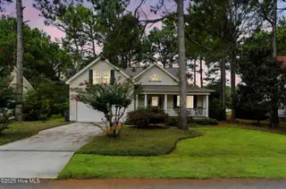 3923 Harmony Circle SE, Southport, NC 28461 – photo 4: 2-web-or-mls-_DSC7289 day to dusk