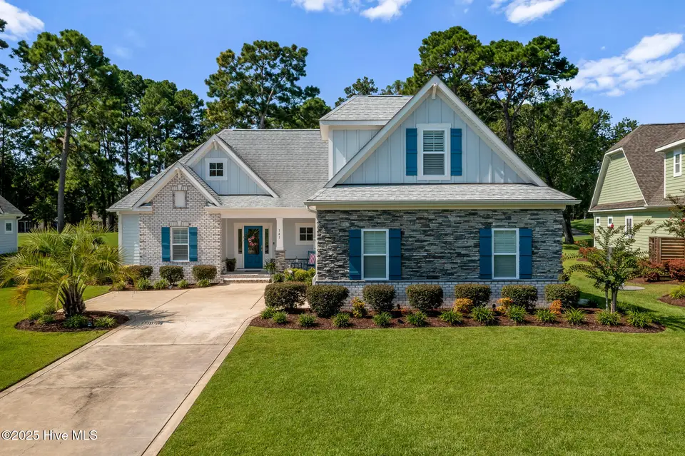 141 Clubhouse Road, Sunset Beach, NC 28468 – photo 1 of 59: Front of House