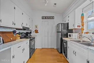 2906 E Dolphin Drive, Oak Island, NC 28465 – photo 17: 44-web-or-mls-DSC08893
