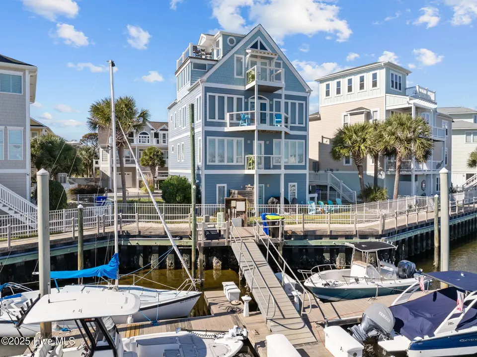 902 Grand Bahama Drive, Carolina Beach, NC 28428 — 5-bedroom home in Federal Point Yacht, Carolina Beach, NC, photo 1 of 68: 1-web-or-mls-DJI_20251104121210_0273_D