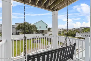 3617 W Pelican Drive, Oak Island, NC 28465 – photo 18: 45_balcony