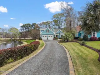 922 Oyster Pointe Drive, Sunset Beach, NC 28468 – photo 2: Front of Home