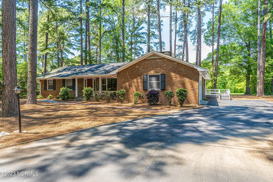 4 Fairway Lane, Whispering Pines, NC 28327 – photo 1 of 21: Front of the House