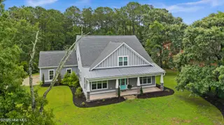 201 S Grist Mill Road, Hampstead, NC 28443 — 4-bedroom home in Pelican Reef, Hampstead, NC, photo 2 of 54: 38-DJI_20250614221629_0042_D