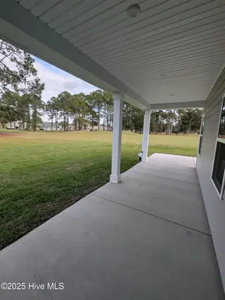 1276 Piper Glen Drive, Sunset Beach, NC 28468 – photo 16: Patio