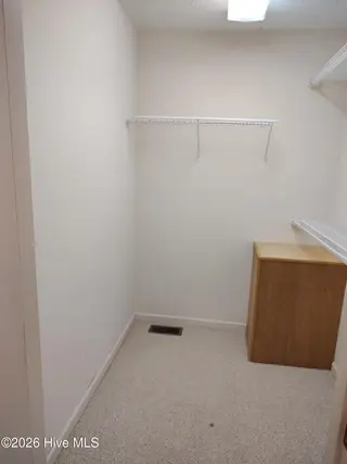 3097 River Hills Drive SW, Shallotte, NC 28470 – photo 12: Mstr Walk-In Closet