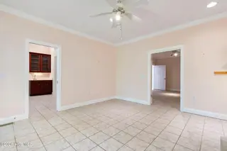 86 Plantation Passage Drive SE, Bolivia, NC 28422 — 4-bedroom home in Winding River Plantation, Bolivia, NC, photo 22 of 77: Family Room