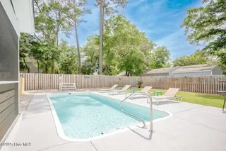 221 NE 58th Street, Oak Island, NC 28465 – photo 6: SALT WATER POOL