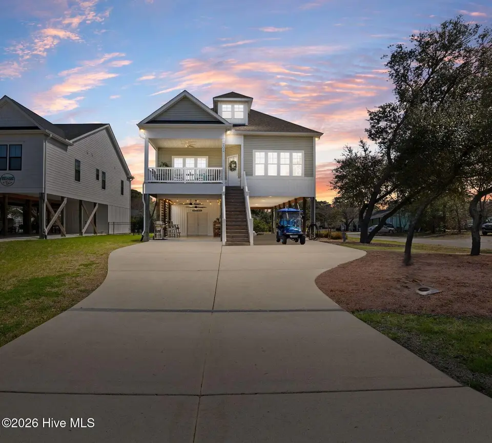 202 NE 64th Street, Oak Island, NC 28465 – photo 1 of 49: Your turn key beach living awaits!