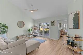 3831 Merestone Drive, Wilmington, NC 28412 – photo 8: 7-living_room_to_slider