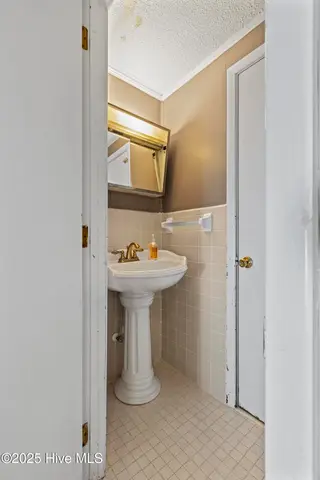 200 Banks Street, Jacksonville, NC 28540 — 3-bedroom home in New River Homes, Jacksonville, NC, photo 19 of 50