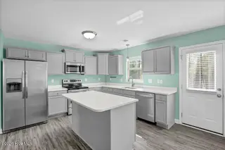 126 Tides End Drive, Holly Ridge, NC 28445 – photo 7: 008_6g8a2246_154