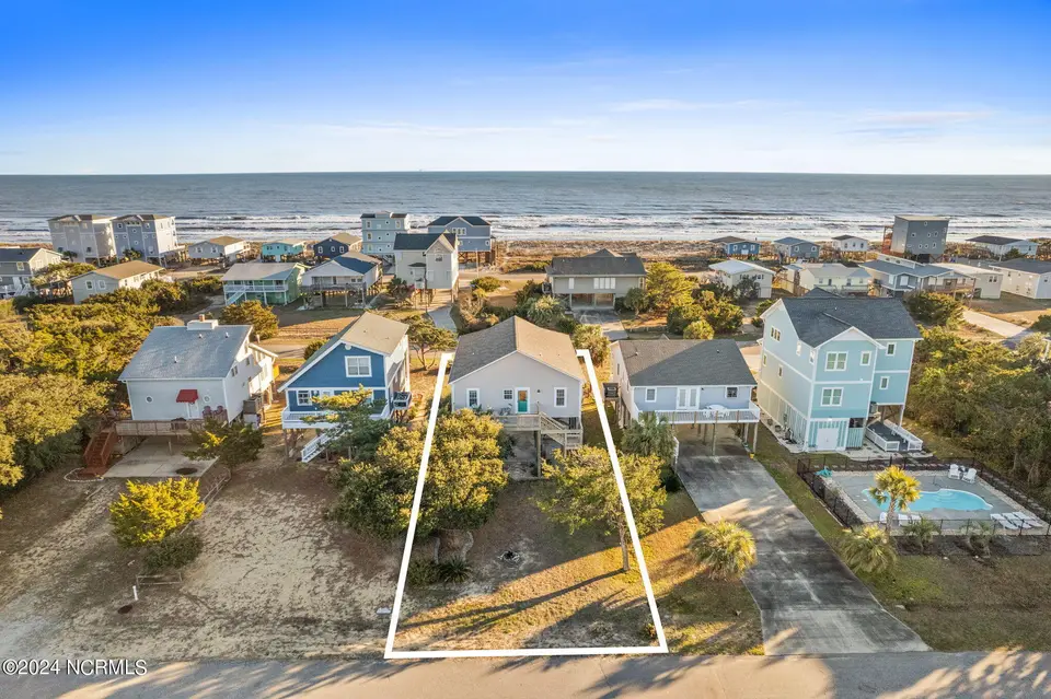 916 E Dolphin Drive, Oak Island, NC 28465 – photo 1 of 61: KahunaPhoto.com 916-40