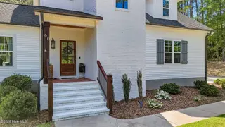 60 Cardinal Drive, Whispering Pines, NC 28327 – photo 3: 4_DJI_20260414151928_0059_D
