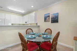 221 Woodlands Way Unit 21, Calabash, NC 28467 — 2-bedroom condo in Crow Creek, Calabash, NC, photo 10 of 39: Dining Space