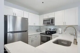 790 New River Inlet Road 205b, North Topsail Beach, NC 28460 — 1-bedroom condo in Villa Capriani, North Topsail Beach, NC, photo 7 of 43: z2tzKPG%21download