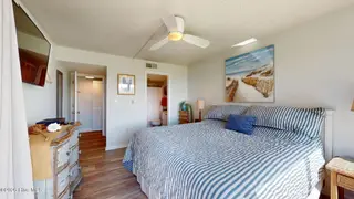 8801 Reed Drive 115, Emerald Isle, NC 28594 – photo 15: Primary Bedroom w/ En Suite