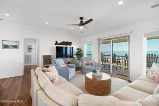1819 Salter Path Road, Indian Beach, NC 28512 – photo 5: Open concept living room opens to deck