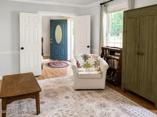 3017 Red Fox Road, Trent Woods, NC 28562 – photo 4: Living Room with Blue Entry Door
