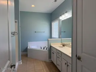 515 Davidson Drive, Newport, NC 28570 – photo 8: 515 Primary ensuite bath