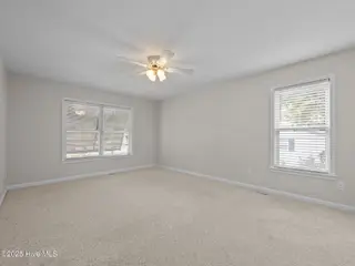 8626 Reed Drive, Emerald Isle, NC 28594 – photo 16: Primary Bedroom
