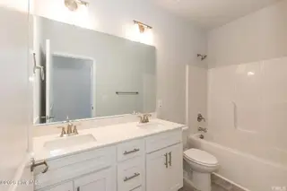 127 White Bark Avenue Lot 17, Rocky Mount, NC 27804 – photo 19: 2030 Guest Bath w: Double Vanities