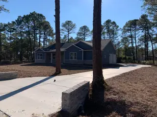 80 Pinewood Drive, Carolina Shores, NC 28467 – photo 2: IMG_9796