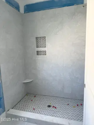 128 W Dolphin Drive, Oak Island, NC 28465 – photo 11: Step in showers