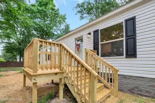 9180 Central Boulevard SE, Winnabow, NC 28479 — 3-bedroom manufactured home in Town Creek Estates, Winnabow, NC, photo 1 of 32